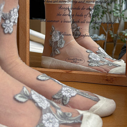 Atmungsaktive Calcetines de Hilo con Blumenstickerei